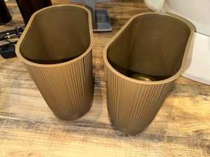 lot 209 image: Two Taupe Wastebaskets