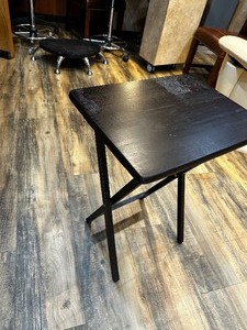 lot 213 image: Two Folding TV Tray Tables in Black - One in photo