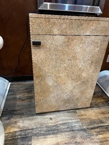 lot 215 image: Laundry  Beverage Cabinet with Door Measuring 24 inches W by 24 inches D by 36 inches H