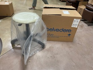 lot 173 image: New in Box Rolling Stool with Cream Vinyl Cover and Black Base
