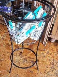 lot 6 image: Round Free Standing  Metal Stand with Metal Basket Measuring 17 inches W by 30 inches H, Basket is removable and measures 14-12 inches W by 14 inches. Stand and Basket only - Contents not included