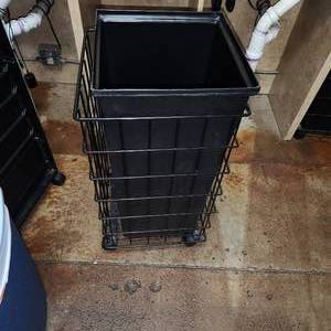 lot 83 image: Rolling Square Black Wire Metal Laundry Bin with Removable Plastic Liner Measuring 14-34 inches by 30-12 inches H. One of 6.