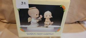 lot 432 image: Precious Moments Figurine Babys First Haircut, Year 1984, Item# 12211