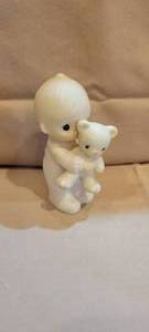 lot 500 image: Precious Moments Figurine  Boy With A Bear , Year 1982, Item# E2852A