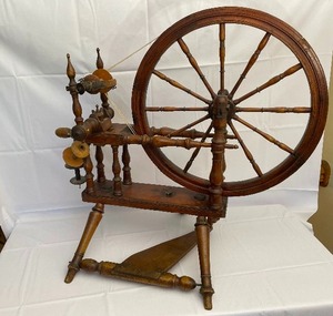 lot 2 image: Antique Spinning Wheel 35 Inches by 32 Inches by 22 Inches. Estimated Value $950-1350