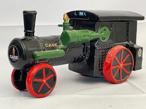 lot 21 image: Classic Case Steam Tractor Cookie Jar. Estimated Value $150-175