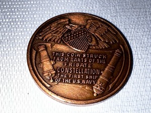 lot 201 image: US Commemorative Coin Struck from Parts of the US Constellation, the First US Frigate.
