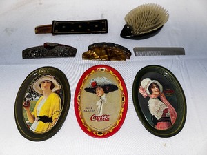 lot 198 image: Antique Combs, Hairbrushes, and Coca-Cola Decorative Platters.