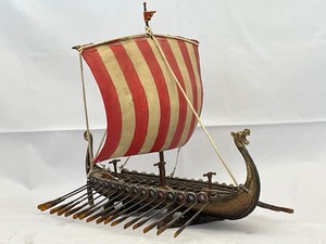 lot 66 image: Antique Hand Carved Wooden Viking Longboat Longship with Oars and Sail. In excellent condition. 13 Inches Long. Estimated Value $850-1250
