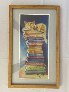 lot 114 image: Car and Book Framed Print. 13 Inches Wide by 21 Inches High.