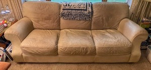 lot 70 image: Leather Couch. 36 Inches by 36 Inches by 88 Inches.