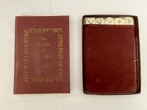 lot 138 image: The Book of Runes and a Set of Rune Tiles.