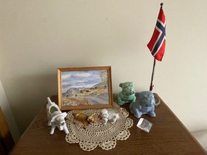 lot 167 image: Porcelain Bulldogs and Cows, Toy Car, Norwegian Flag, and Countryside Print.