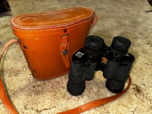 lot 438 image: Holiday Coated Optics 7 x 35 Binoculars in Leather Case.