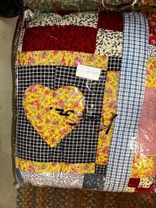 lot 444 image: Bin of Quilts.