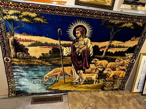 lot 497 image: Tapestry of Jesus and Sheep. Measuring 58 Inches by 38 Inches.