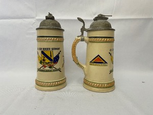 lot 256 image: Two Beer Steins as Seen in Pictures.