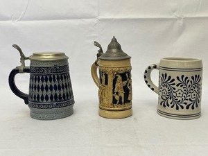 lot 259 image: Three Beer Steins as Seen in Pictures.