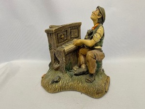 lot 280 image: Porcelain Piano Player.