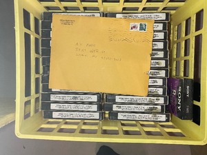lot 486 image: Bin of Car VHS Tapes.