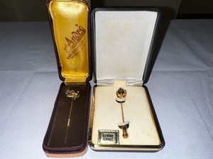 lot 356 image: Two vintage label pins with genuine garnets