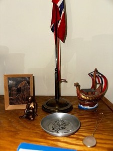 lot 104 image: Norwegian Flag and Desktop Flagpole, Viking Ship and Other Decorative Items as Seen in Photo.