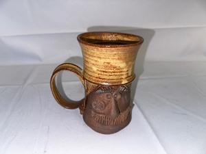 lot 106 image: Vintage Hand Thrown Pottery Mug.