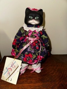 lot 409 image: Victoria Ashley Original Cat Doll in Dress.