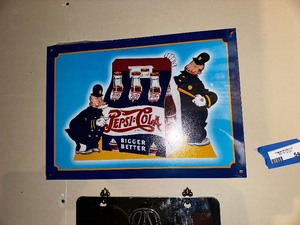 lot 540 image: Pepsi-Cola and Acura Signs.