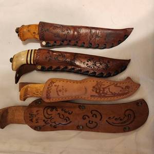lot 349 image: Set of Four Souvenir Scandinavian HuntingFishing Knife in Decorative Leather Sheath