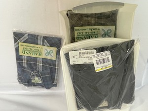 lot 149 image: Three Long Sleeve Flannel Shirts and One Polo Shirt. Brand New in Package. One L.L. Bean, Two Haband Brand, and Other.