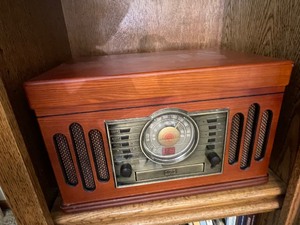 lot 48 image: Vintage Style Crosley Radio CR73 The Conductor Entertainment Center. Radio Tuner, Cassette, Phonograph, and CD Player. Owners Manual Included. Case of a Variety of Audio Cassettes. Estimated Value $50-100
