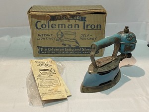 lot 40 image: Antique Coleman Instant Lite Iron in Original Box. Estimated Value $60-120