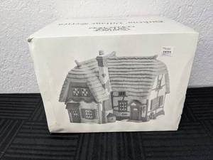 lot 131 image: Dept. 56 Heritage Village Collection Dickens Village Series Cobb Cottage Handpainted Porcelain House