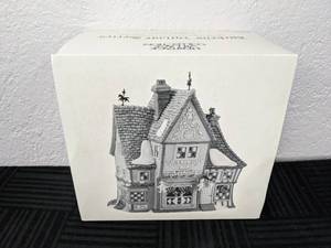 lot 118 image: Dept. 56 Heritage Village collections Dickens Village Nettie Quinn Puppers & Marionettes