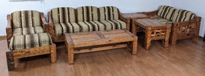 lot 10 image: Texas Style Wood Furniture Set Couch, Love Seat, Chairs, Ottoman, End Tables and Table