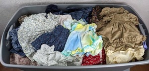 lot 105 image: Large Miscellaneous Assortment of Doll Clothes
