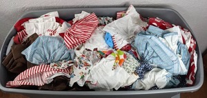 lot 106 image: Large Miscellaneous Assortment of Doll Clothes