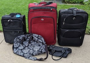 lot 96 image: Atlantic and American Tourister Rolling Suitcases, Foldable Travel Bag and Black Handbag