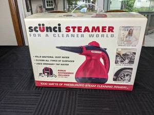 lot 30 image: New Scunci Steamer
