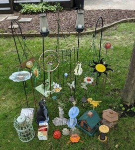 lot 62 image: Lawn & Garden Decorations Hummingbird Feeders, Bird Feeders, Solar Lights, Hooks and Other Decor