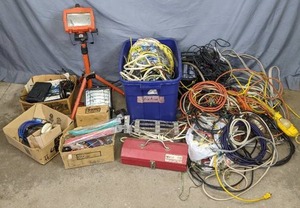lot 40 image: Shop Lights, Power Cords, Cables, Red Metal Toolbox, and Other Accessories