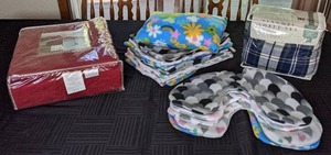 lot 91 image: New Red Solid Cotton Quilt - FullQueen, New Flannel Sheet Set - Queen, (9) Unfinished Small Pillows and (7) Unfinished Neck Pillows