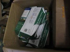 box of copy paper , garbage bags and more