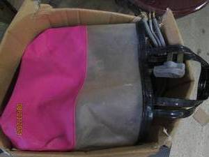 box of boots , corks , shoes, stove cord and more