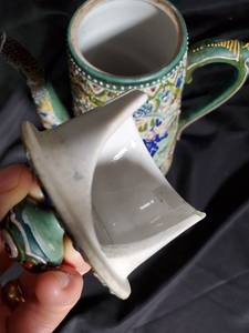 lot 9 image: Vintage Hand-Painted Ceramic Teapot with Intricate Designs