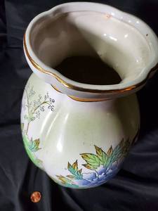 lot 24 image: Hand-Painted Porcelain Vase with Peacock Design