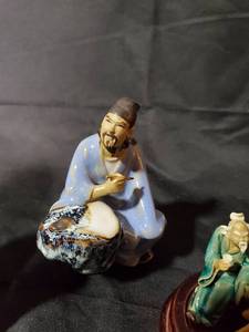 lot 44 image: Lot of 7 Chinese Ceramic Figurines and Red Decorative Cylinder