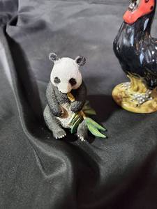lot 48 image: Animal Figurine Lot - Panda, Roosters, and Pelicans