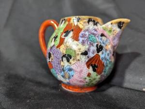 lot 126 image: Vintage Hand-Painted Ceramic Creamer with Geisha Design